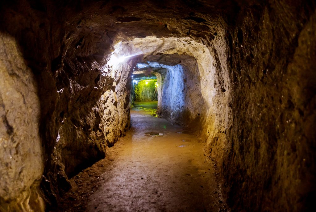 Underground mine passage with light in the tunnel mining industry